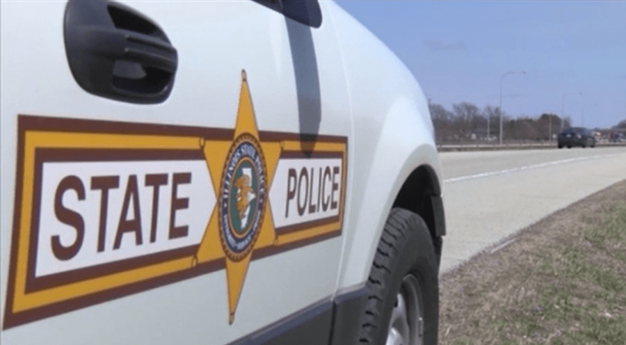 Truck-tractor semi-trailer rolls over on I-74 ramp in Normal