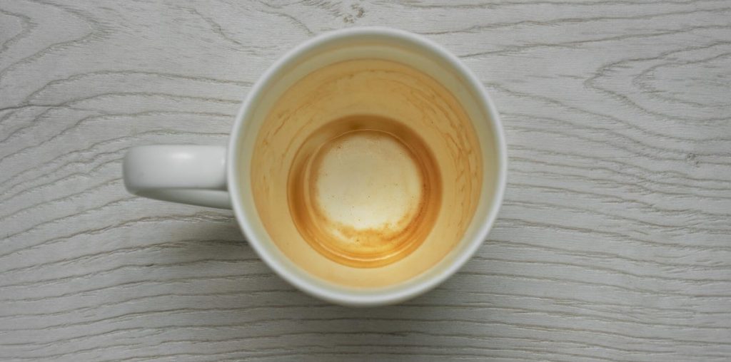 aerial view of mug with coffee stains